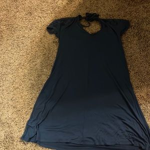 Blue dress with pretty flower designs on the shoulder with a small open back.